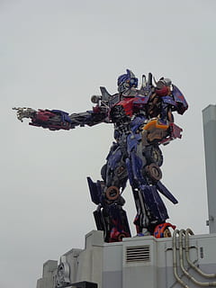 optimus prime, ρομπότ, τεχνητή νοημοσύνη, ρομποτική, μελλοντικός, φουτουριστικό, επιστήμη, άνδρας, cyborg, sci-fi, επιστημονική φαντασία, ουρανός, αναπαράσταση, χαμηλή οπτική γωνία, ανθρώπινη εκπροσώπηση, την τέχνη και τη βιοτεχνία, γλυπτική, αρχιτεκτονική, δημιουργικότητα, καθαρός ουρανός, άγαλμα, φύση, χωρίς κόσμο, ανδρική ομοιότητα, δομημένη δομή, ημέρα, σκάφος, σε εξωτερικό χώρο, εξωτερικό κτίριο, Κτίριο, ταξίδι, κυβέρνηση, 4K, CC0, δημόσιος τομέαςα, χωρίς δικαιώματαe