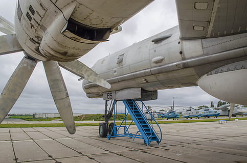 plane, engine, turbine, screw, rakurs, wing, chassis, the fuselage, propeller, porthole, blades, aviation, sky, air vehicle, transportation, airplane, mode of transportation, industry, no people, day, outdoors, airport, aerospace industry, fuel and power generation, architecture, business, nature, travel, connection, land, built structure, flying, metal, 4K, CC0, public domain, royalty free
