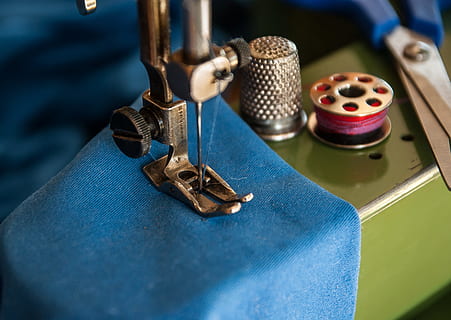 shallow, focus, sewing machine, blue, textile, shallow focus, couture, thimble, wire scissors, high angle view, indoors, industry, manufacturing equipment, no people, close-up, metal, table, equipment, accuracy, focus on foreground, selective focus, arts culture and entertainment, still life, thread, technology, leather, silver colored, 2K, CC0, public domain, royalty free