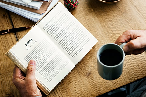person, holding, mug, opened, book, table, read, knowledge, wisdom, coffee, people, hand, man, chapters, wood, pen, school, study, business, human hand, human body part, one person, one man only, food and drink, coffee - drink, indoors, coffee cup, cup, paper, drink, publication, adult, wood - material, refreshment, body part, finger, crockery, 5K, CC0, public domain, royalty free