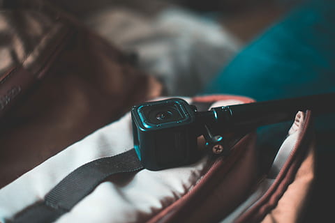 selective, focus photography, black, webcam, camera, brown, case, gopro, technology, gear, tech, packing, bag, holiday, vacation, teal, action, selfie, hero, aesthetic, close, holding, hand, human body part, human hand, close-up, people, gun, indoors, body part, adult, casual clothing, weapon, social issues, selective focus, men, midsection, photography themes, bed, 5K, CC0, public domain, royalty free