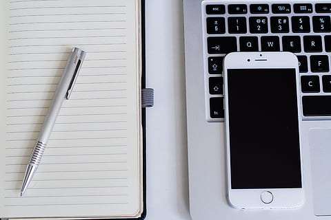 silver iphone 6, notebook, click pen, apple, computer, iphone, keyboard, laptop, mobile phone, pen, smartphone, technology, communication, wireless technology, connection, computer keyboard, computer equipment, no people, table, portable information device, still life, business, white color, high angle view, indoors, publication, close-up, computer key, silver colored, blank, 4K, CC0, public domain, royalty free