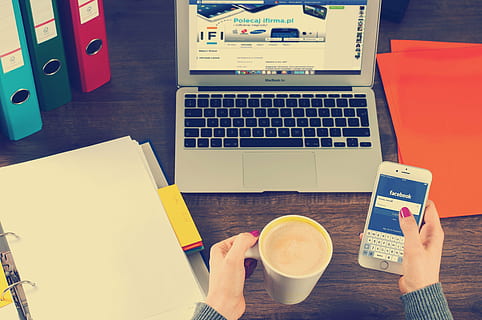 person, holding, iphone, cup, coffee, woman, pink, nail, manicure, using, gold, front, macbook, air, brown, wooden, desk, laptop, computer, business, office, work, hands, facebook, social media, mobile, phone, smartphone, binders, folders, paper, internet, wireless technology, technology, communication, indoors, portability, portable information device, human body part, table, connection, human hand, food and drink, hand, adult, one person, drink, high angle view, computer equipment, keyboard, buying, 4K