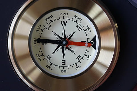 round silver compass, compass, north, compass point, navigation, navigate, show, points of the compass, direction, windrose, directory, needle, orient, orientation, number, close-up, accuracy, single object, no people, indoors, circle, time, equipment, geometric shape, metal, clock hand, motion, dial, silver colored, man made object, retro styled, man made, obsolete, minute hand, clock face, 5K, CC0, public domain, royalty free