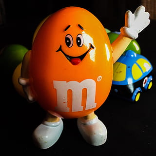 candy, toy, easter, mm, fun, childhood, child, kids, halloween, treat, representation, art and craft, creativity, no people, human representation, indoors, still life, close-up, orange color, craft, anthropomorphic, anthropomorphic face, face, single object, rubber duck, pumpkin, 2K, CC0, public domain, royalty free