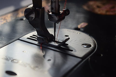 close-up photo, sewing machine, tailor, sewing, machine, machinery, industry, equipment, textile industry, close-up, indoors, manufacturing equipment, thread, textile, selective focus, technology, machine part, sewing needle, accuracy, work tool, needle, factory, electrical equipment, 5K, CC0, public domain, royalty free