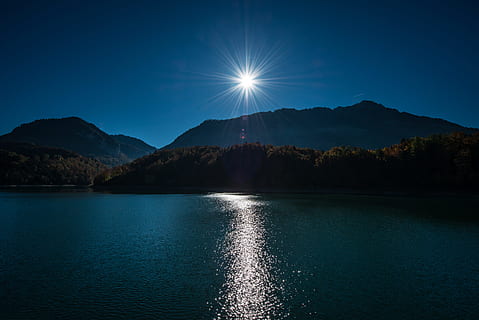 brown, mountain, body, water, photo, island, night time, silhouette, body of water, night sky, nature, lake, landscape, scenics, sky, blue, reflection, outdoors, no People, mountain Range, tranquil Scene, beauty In Nature, summer, color Image, night, scenics - nature, tranquility, waterfront, sunlight, lens flare, non-urban scene, sunbeam, idyllic, 5K, CC0, public domain, royalty free