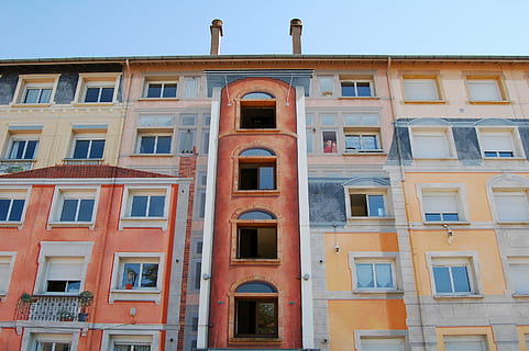 brown, beige, building, red, concrete, architecture, structure, window, sky, building exterior, outdoors, built structure, no people, day, close-up, low angle view, residential district, city, in a row, side by side, nature, repetition, clear sky, glass - material, full frame, arch, apartment, 2K, CC0, public domain, royalty free