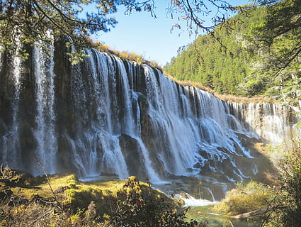 waterfalls, clear, blue, sky, water, falls, time, laps, photography, daytime, river, grass, trees, green, nature, rocks, Nuoerliang Waterfall, Jiuzhaigou, China, tree, waterfall, rock - object, scenics, day, no people, cliff, scenics - nature, flowing water, beauty in nature, plant, forest, long exposure, land, non-urban scene, rock, motion, tranquil scene, environment, power in nature, flowing, outdoors, falling water, 2K, CC0, public domain, royalty free