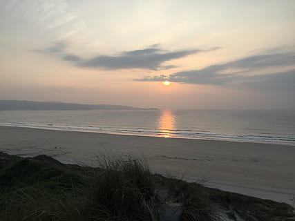 cornwall, sunset, beach, sky, sea, water, beauty in nature, land, scenics - nature, cloud - sky, tranquility, tranquil scene, horizon over water, nature, sand, horizon, sun, idyllic, no people, non-urban scene, outdoors, marram grass, 2K, CC0, public domain, royalty free