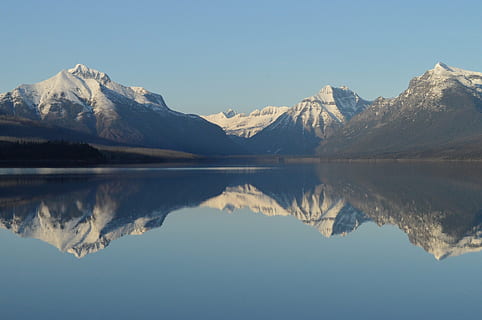 calm, cold, dawn, daylight, fog, frosty, garden wall, glacier, glacier national park, ice, lake, lake mcdonald, landscape, Montana, mount brown, mount cannon, mount stanton, mount vaught, mountain, mountains, outdoors, panorama, peaceful, peak, reflection, serene, skyline, snow, travel, usa, volcano, water, wilderness, winter, nature, scenics, sky, mountain Range, scenics - nature, symmetry, tranquility, tranquil scene, beauty in nature, no people, waterfront, day, clear sky, idyllic, cold temperature, snowcapped mountain, mountain peak, reflection lake, 1080P, CC0, public domain, royalty free