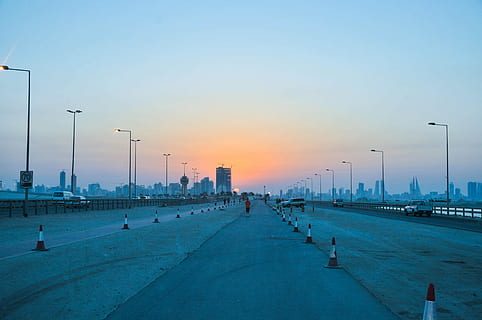 Sunset, Sundown, Bahrain, sunset, sundown, water, outdoors, cold temperature, harbor, street light, sky, street, architecture, city, transportation, built structure, road, in a row, building exterior, nature, lighting equipment, diminishing perspective, the way forward, direction, no people, dusk, twilight, landscape, post, skyscraper, cityscape, 4K, CC0, public domain, royalty free