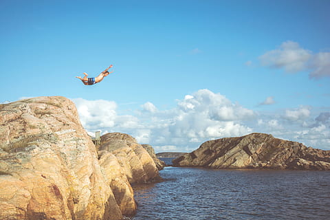 guy, man, diving, swimming, rocks, cliff, summer, sunshine, blue, sky, clouds, outdoors, adventure, nature, rock, mid-air, rock - object, water, solid, one person, rock formation, beauty in nature, scenics - nature, day, flying, jumping, human arm, mountain, sea, limb, leisure activity, arms raised, human limb, 5K, CC0, public domain, royalty free