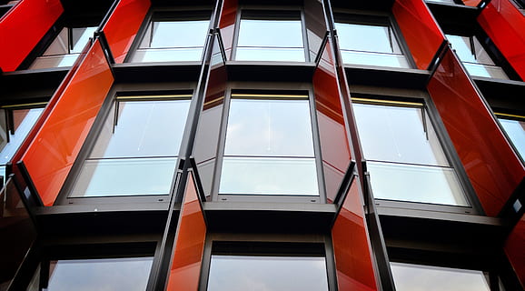 concrete, structure, black, metal frame, clear, glass panel windows, window, office, facade, architecture, sunscreen, building, planning, low angle view, built structure, glass - material, building exterior, red, no people, backgrounds, full frame, city, reflection, modern, pattern, outdoors, sky, cloud - sky, office building exterior, alloy, skyscraper, 4K, CC0, public domain, royalty free