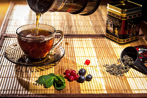 liquid, poured, teacup, tea, maker, herb, drink, cup, green tea, leaf tea, currant, peppermint leaf, tea ceremony, food and drink, food, healthy eating, freshness, refreshment, fruit, berry fruit, table, wellbeing, no people, indoors, still life, close-up, blueberry, high angle view, household equipment, blackberry - fruit, teapot, focus on foreground, glass, tea cup, 5K, CC0, public domain, royalty free