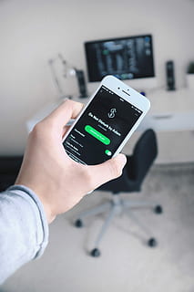person, holding, iphone, showing, spotify application, displaying, disturb, adam, iphone7, workspace, mac, monochromatic, technology, tech, do not disturb, simplicity, apple, minimalist, minimalism, iphone6, macbook, monochrome, human hand, hand, real people, one person, human body part, connection, wireless technology, communication, focus on foreground, lifestyles, indoors, close-up, number, mobile phone, portable information device, personal perspective, screen, finger, 4K, CC0, public domain, royalty free
