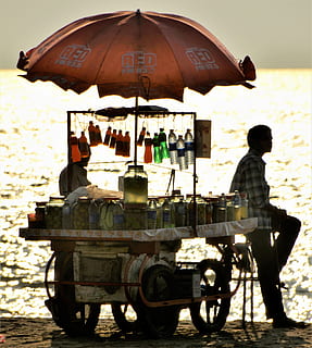 bevande analcoliche, venditore, spiaggia, tramonto, morbido, bevande, Calicut, India, solo adulti, adulto, persone, Solo uomini, all'aperto, seduta, ombrello, giorno, natura, gruppo di persone, modo di trasporto, persone reali, uomini, luce del sole, Al dettaglio, mezzi di trasporto, piccola impresa, persone accessorie, protezione, architettura, veicolo terrestre, uniforme, 2K, CC0, dominio pubblico, privo di copyright