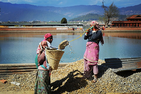 struggle, work, job, water, real people, basket, mountain, day, hat, women, nature, container, lifestyles, adult, clothing, casual clothing, people, sunlight, occupation, holding, full length, river, outdoors, mountain range, 5K, CC0, public domain, royalty free