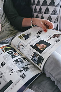 designer magazine, couch, Woman reading, designer, magazine, woman, reading, style, design, business, people, men, human Hand, finance, adults only, indoors, one person, adult, one man only, real people, midsection, hand, paper, sitting, high angle view, table, holding, lifestyles, book, publication, leisure activity, furniture, document, 5K