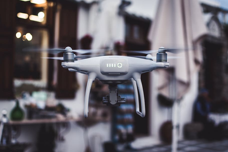 drone quadcopter gris, càmera, drone, hd, helicòpter, fotografia, borrós, a l'aire lliure, tecnologia, centrar-se en primer pla, persones incidentals, primer pla, a l'interior, temes de fotografia, enfocament selectiu, comunicació, dia, càmera - equip fotogràfic, negocis, viatjar, transport, modern, gestionar, arquitectura, manera de transport, 5K