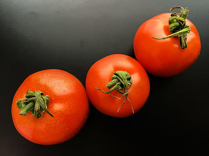 tomato, fruit, vegetable, fresh, red, food, healthy, organic, vegetarian, natural, food and drink, healthy eating, wellbeing, black background, indoors, freshness, studio shot, no people, still life, close-up, healthy lifestyle, orange color, group of objects, raw food, three objects, ripe, vegetarian food, 4K, CC0, public domain, royalty free