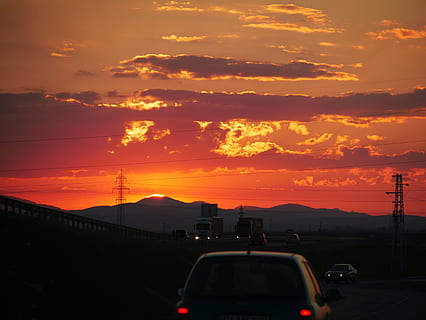 sunset, sky, landscape, clouds, horizon, nature, orange color, cloud - sky, car, land vehicle, mode of transportation, beauty in nature, motor vehicle, transportation, scenics - nature, silhouette, mountain, no people, dramatic sky, outdoors, street, road, idyllic, 4K, CC0, public domain, royalty free