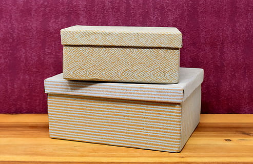 boxes, cardboard, gift box, packaging material, packaging, cardboard boxes, structure, indoors, table, wood - material, no people, stack, still life, close-up, single object, flooring, wall - building feature, box, box - container, wood, container, studio shot, purple, simplicity, man made object, seat, 5K, CC0, public domain, royalty free