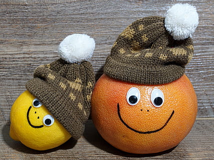 yellow, lemon, orange, fruit, brown, knit, caps decor, grapefruit, faces, cheerful, fresh fruit, funny, healthy, vitamins, delicious, food, frisch, nutrition, comic, eat, exotic, früchtchen, smilies, laugh, bless you, children, edible, card greeting, mood, atmospheric, still life, emotion, friends, family, vitamin c, fit, fitness, anti-agin, sweet fruit, activating, invigorating, refreshment, revitalizing, citrus fruit, citrus fruits, representation, no people, toy, hat, winter, anthropomorphic, wood - material, orange color, human representation, stuffed toy, close-up, anthropomorphic face, art and craft, face, anthropomorphic smiley face, knit hat, day, clothing, 4K, CC0, public domain, royalty free