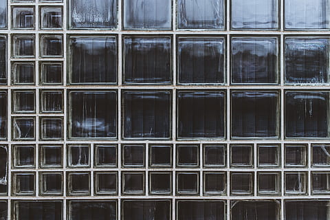 clear glass block, closeup, photo, glass wall, window, glass, pattern, box, square, full frame, backgrounds, glass - material, architecture, built structure, shape, geometric shape, no people, building exterior, square shape, transparent, building, reflection, day, design, outdoors, in a row, grid, window frame, 5K, CC0, public domain, royalty free
