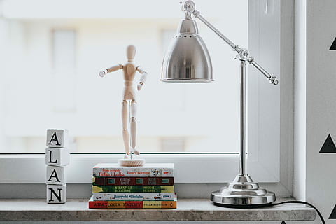 mannequin, various, poses, Wooden, hand, wood, model, yarn, pencils, puppet, posing, dummy, doll, figure, thread, gesture, indoors, domestic Room, home Interior, rear view, one person, hanging, balance, full length, lighting equipment, electric lamp, table, focus on foreground, no people, weight scale, publication, stack, scale, toy, figurine, still life, furniture, day, book, representation, human representation, technology, 5K