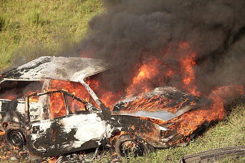white, car, fire, green, grass, daytime, under fire, green grass, burning, wreck, accident, danger, flame, destruction, emergency, inferno, no people, outdoors, day, heat - temperature, fire - natural phenomenon, smoke - physical structure, land, nature, damaged, orange color, environment, abandoned, field, metal, environmental issues, pollution, air pollution, demolished, 5K, CC0, public domain, royalty free