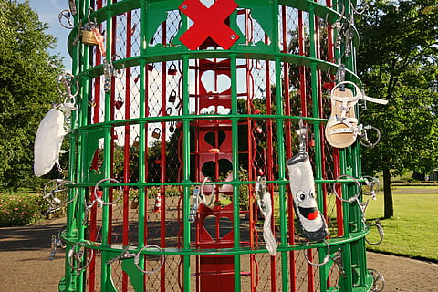 lost, finding, object, owner, lost-and-found, claim, retrieval, rack, lost-and-found rack, day, plant, tree, no people, animal representation, park, representation, nature, playground, park - man made space, outdoor play equipment, multi colored, outdoors, metal, arts culture and entertainment, green color, red, decoration, amusement park, jungle gym, 4K, CC0, public domain, royalty free