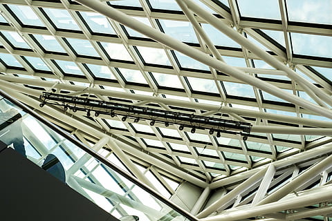 angle, architecture, building exterior, construction, contemporary, design, expression, futuristic, geometric, industry, modern, perspective, reflection, steel, urban, low angle view, built structure, pattern, no people, ceiling, indoors, metal, day, building, architectural feature, glass - material, window, roof, repetition, sunlight, skylight, office building exterior, roof beam, architecture and art, silver colored, 4K