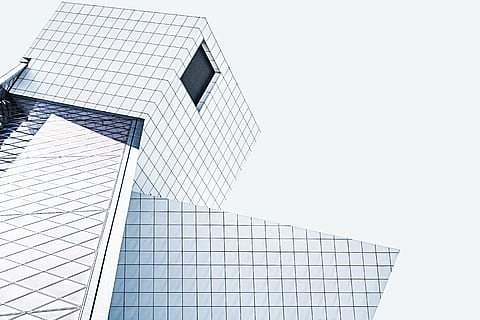 low-angle view, building, architecture, infrastructure, design, hole, built Structure, building Exterior, office building exterior, modern, city, sky, low angle view, office, no people, clear sky, pattern, day, skyscraper, glass - material, nature, tall - high, copy space, tower, 5K