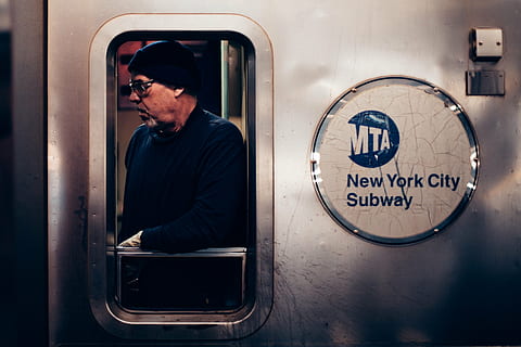 man, leaning, mta, new, york, city, subway, train, door, people, guy, sweatshirt, beanie, travel, transportation, land, beard, steel, glass, window, adult, open, one person, mature adult, one man only, old-fashioned, adults only, men, males, mode of transportation, communication, text, glasses, senior adult, working, real people, emotion, looking, 4K, CC0, public domain, royalty free