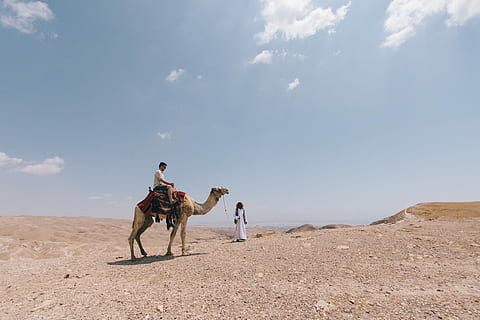 man, riding, camel, outdoors, men, adult, women, color Image, image Technique, desert, human Age, people, image Type, time Of Day, africa, ethnicity, copy Space, natural Phenomenon, adults Only, nature, moving Activity, physical Position, group Of People, day, small Group Of People, caucasian Ethnicity, horse, mid adult, two people, mammal, land, sky, domestic animals, sand, full length, landscape, environment, cloud - sky, travel, sand dune, one animal, climate, arid climate, 5K, CC0, public domain, royalty free