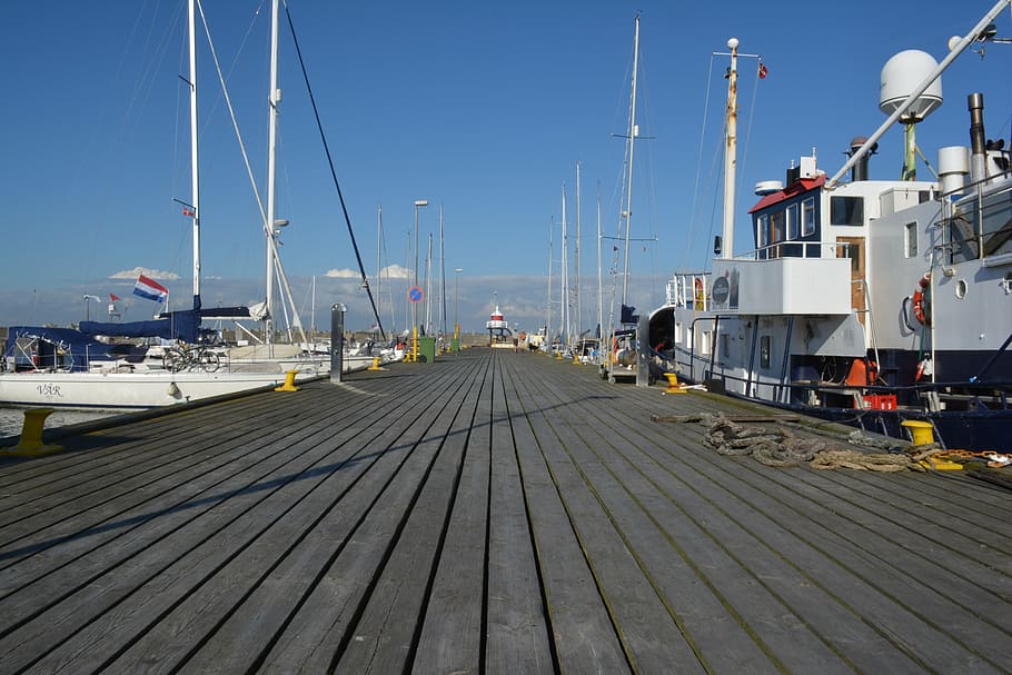 thyborøn, Dinamarca, port, transport, arquitectura, aigua, cel, estructura construïda, naturalesa, exterior de l'edifici, mar, vaixell nàutic, moll, manera de transport, dia, direcció, cel clar, sendera, persones incidentals, el camí a seguir, ciutat, a l'aire lliure, perspectiva decreixent, veler, 5K