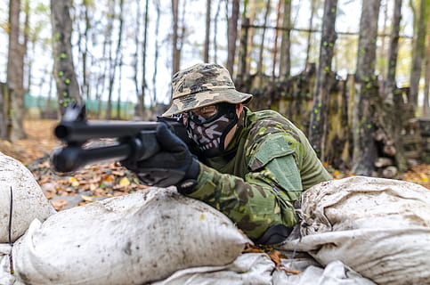 soldier, holding, rifle, daytime, action, armed, army, automatic, background, blur, camouflage, clothing, combat, forest, gun, male, man, mask, military, military uniform, outdoors, person, target, training, trees, uniform, weapon, wear, woods, royalty  images, armed forces, army soldier, government, adult, camouflage clothing, conflict, lying down, fighting, men, people, tree, war, day, machine gun, aggression, 4K
