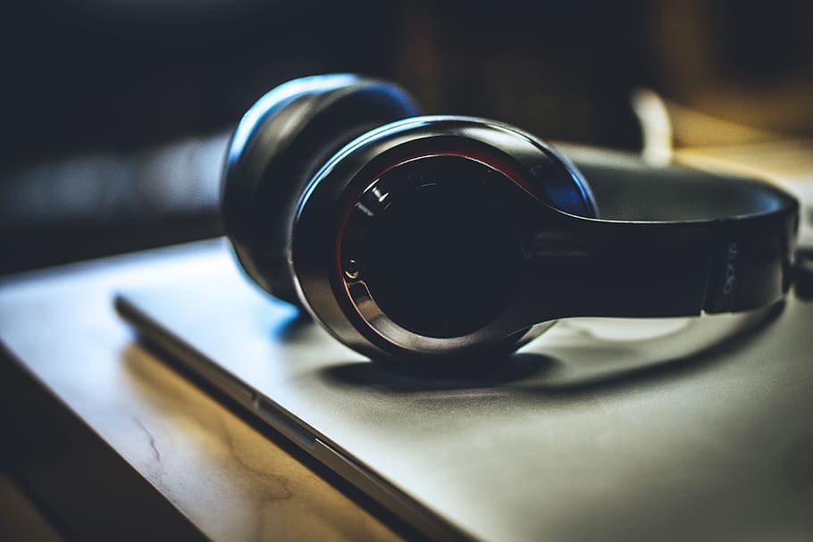silver headphones, resting, laptop, Silver, headphones, technology, music, legal System, no people, indoors, close-up, day, focus on foreground, table, still life, social issues, equipment, lens - optical instrument, single object, black color, glasses, security, personal accessory, protection, selective focus, safety, fashion, electrical equipment, 4K