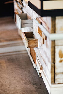 installation, shelves, Wooden, art, shelf, exhibit, planks, wood - Material, warehouse, box - Container, crate, indoors, stack, industry, cellar, no people, selective focus, in a row, focus on foreground, architecture, large group of objects, close-up, brown, building, built structure, day, still life, white color, arrangement, wall - building feature, flooring, 5K