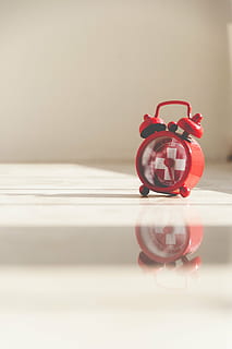 alarm clock, clock, reflection, time, close-up, no people, indoors, red, single object, table, toy, deadline, still life, focus on foreground, clock face, bell, copy space, selective focus, accuracy, retro styled, man made, 4K