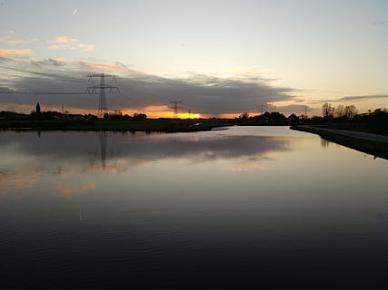 view, sun, dawn, cloud, water, lake, dark, shadow, black, grey, blue, nice, landscape, path, clouds, sky, sunset, reflection, beauty in nature, scenics - nature, cloud - sky, waterfront, tranquility, no people, nature, tranquil scene, fuel and power generation, silhouette, idyllic, electricity pylon, electricity, standing water, outdoors, power supply, 4K, CC0, public domain, royalty free
