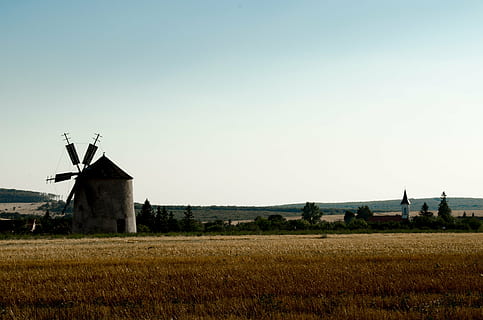 white, brown, windmill, daytime, mill, old windmill, monument, throughout the windmill, bakony mountain windmill, gabonaőrlő, sunset, jay b plateau, rural Scene, agriculture, old, farm, field, landscape, nature, church, environment, fuel and power generation, renewable energy, wind turbine, turbine, alternative energy, wind power, sky, environmental conservation, traditional windmill, built structure, architecture, land, plant, building exterior, no people, outdoors, 4K, CC0, public domain, royalty free