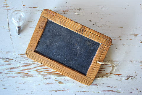 rectangular, brown, wooden, framed, board, incandescent, bulb, school, old, plate, learning, old school, learn, student, child, vintage, knowledge, class, black, read, years, historic, teaching, light, idea, concept, chalkboard, frame, rustic, chalk, lightbulb, teach, think, energy, drawing, symbol, blackboard, draw, write, lamp, plan, sketch, genius, creativity, inspiration, strategy, business, education, solution, success, wood - material, food and drink, no people, indoors, high angle view, food, directly above, studio shot, table, still life, household equipment, cutting board, close-up, backgrounds, shape, drink, wood grain, menu, 2K