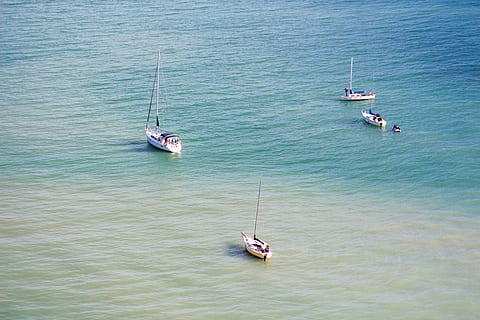 four, sailboats, water, daytime, blue, sea, ocean, nature, ship, boat, sailing, people, passengers, nautical vessel, high angle view, transportation, day, no people, outdoors, mode of transportation, tranquility, tranquil scene, beauty in nature, men, motion, adult, leisure activity, scenics - nature, sailboat, 5K