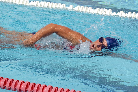 person, swimming, pool, swimmer, training, water, goggles, cap, fitness, female, race, active, adult, style, stroke, swimming pool, men, lifestyles, leisure activity, athlete, motion, nature, sport, people, real people, healthy lifestyle, competition, headshot, shirtless, outdoors, human arm, 4K, CC0, public domain, royalty free