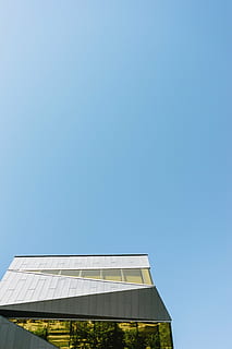 low, angle photography, white, house, sunlight, architecture, building, infrastructure, structure, establishment, apartment, windows, condominium, hotel, nature, blue, clouds, sky, clear sky, copy space, sunny, outdoors, day, built structure, no people, building exterior, low angle view, roof, high section, fuel and power generation, renewable energy, 5K