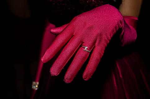 person, wearing, red, gloves, silver-colored ring, hand, ring, sleeve, rosa, one person, close-up, clothing, midsection, focus on foreground, indoors, fashion, textile, adult, human body part, arts culture and entertainment, jewelry, emotion, coat, selective focus, day, luxury, warm clothing, 4K, CC0, public domain, royalty free
