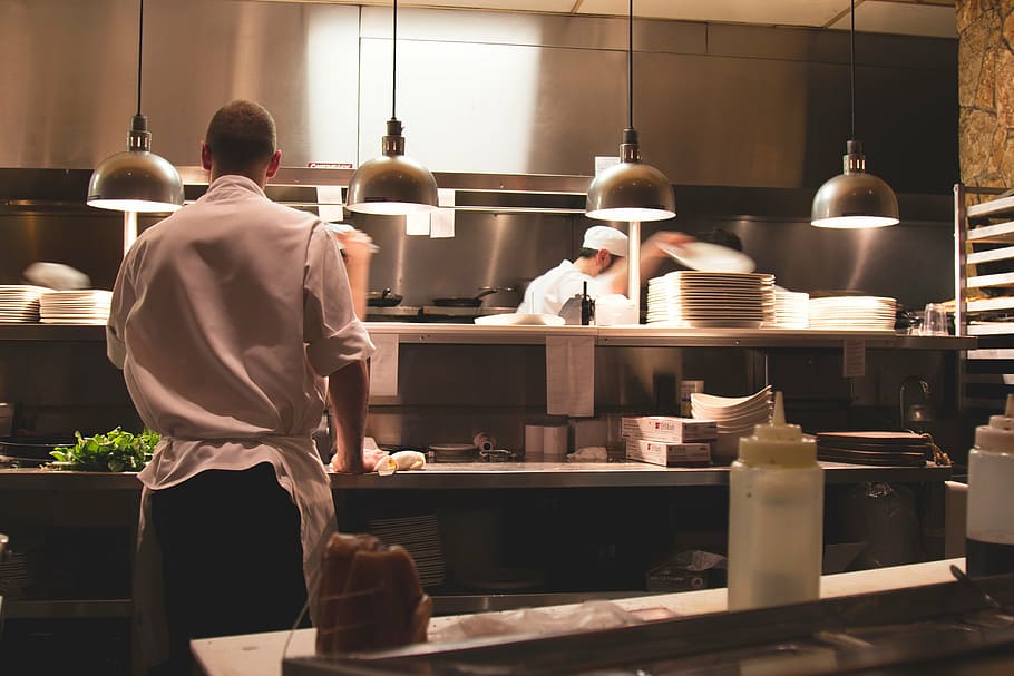 man cooking dish, photo, chef, cooking, inside, kitchen, restaurant, chefs, cooks, food, culinary, indoors, adult, adults only, people, only men, one man only, young adult, men, one person, occupation, rear view, real people, working, business, food and drink, preparation, standing, commercial kitchen, illuminated, arrangement, store, women, small business, uniform, 5K