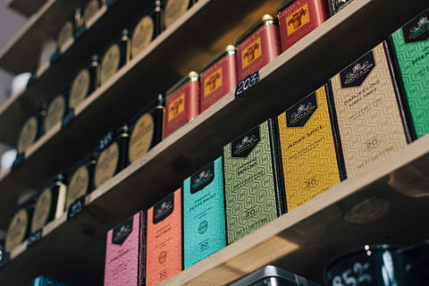 premium boxed tea, Premium, boxed, tea, drink, shelf, store, old, in A Row, indoors, education, book, library, order, bookshelf, publication, large group of objects, no people, selective focus, variation, wood - material, choice, arrangement, learning, text, collection, 5K, CC0, public domain, royalty free